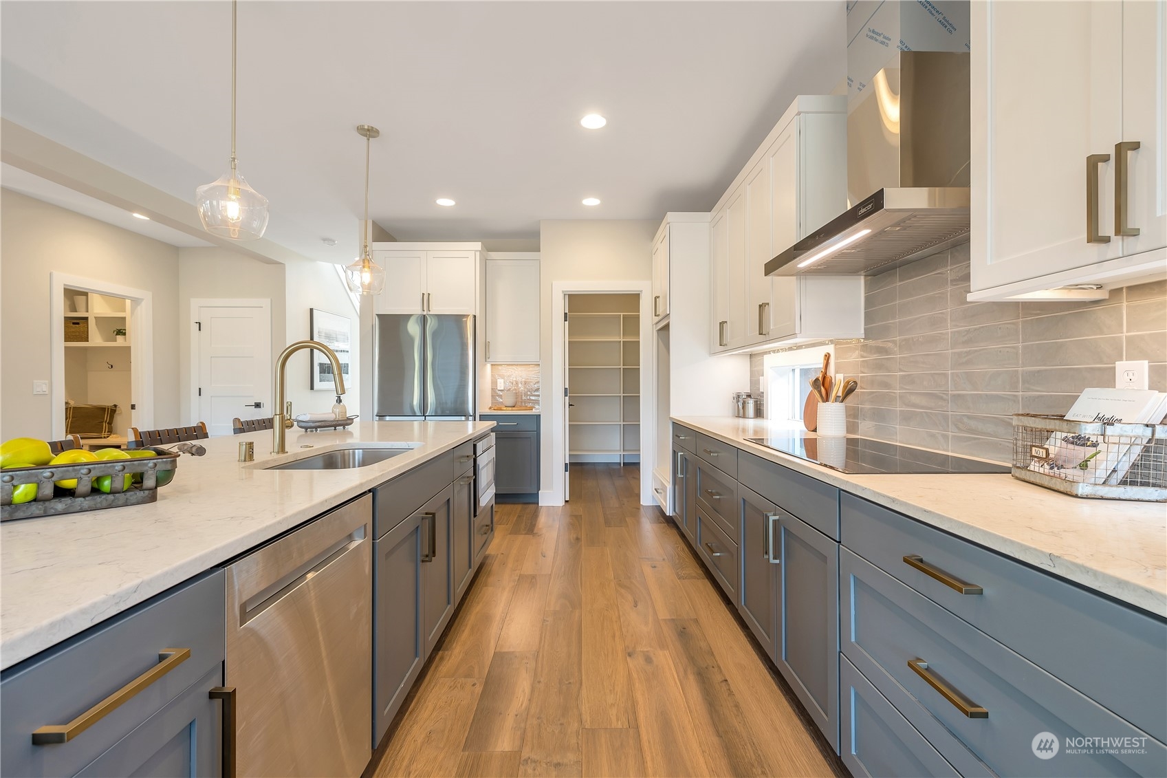 421 Rockefeller Avenue Everett, WA 98201 - Photo 11 of 35 a large kitchen with stainless steel appliances lots of counter space and a sink