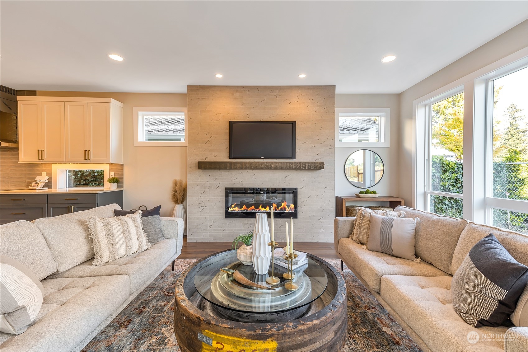 421 Rockefeller Avenue Everett, WA 98201 - Photo 13 of 35 a living room with furniture a fireplace and a large window