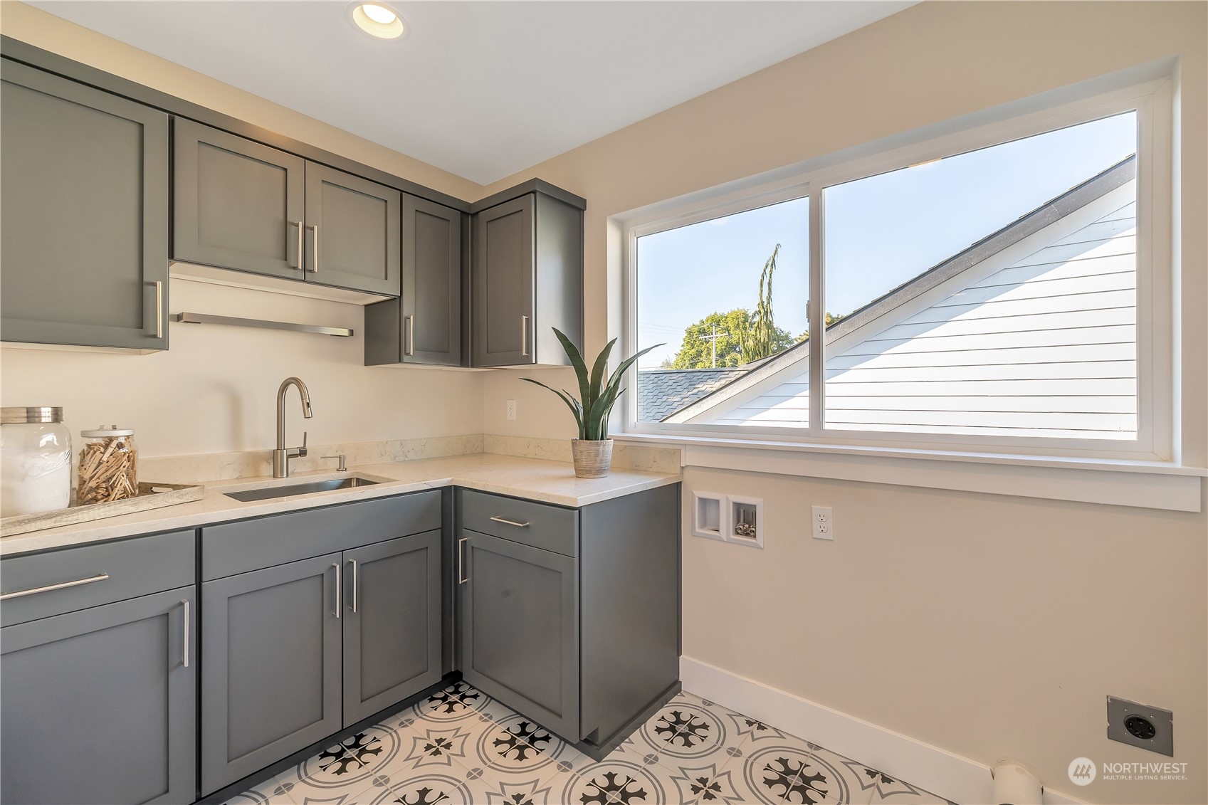 421 Rockefeller Avenue Everett, WA 98201 - Photo 18 of 35 a kitchen with a sink and cabinets
