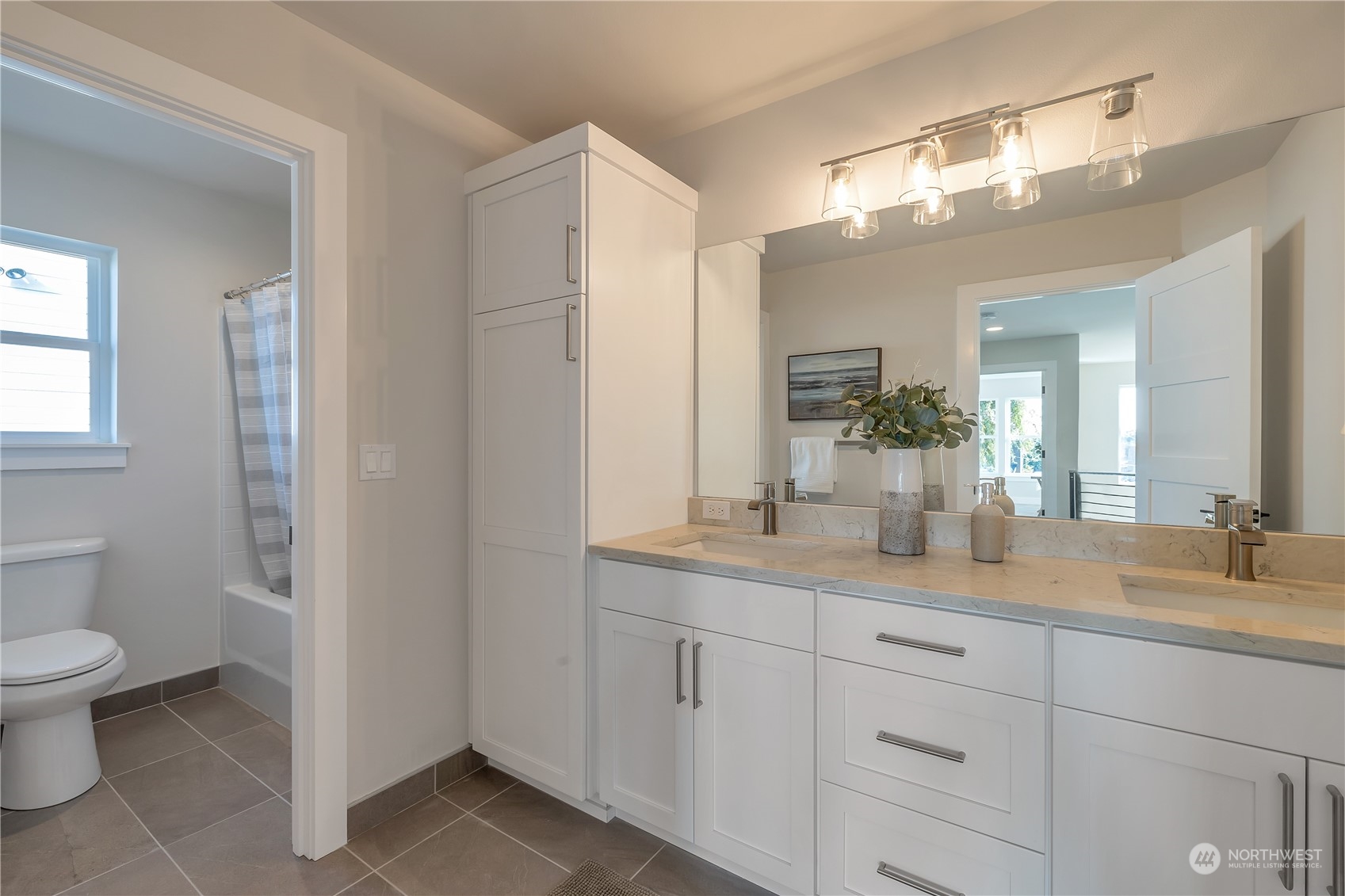 421 Rockefeller Avenue Everett, WA 98201 - Photo 20 of 35 a bathroom with a granite countertop sink a toilet and a mirror
