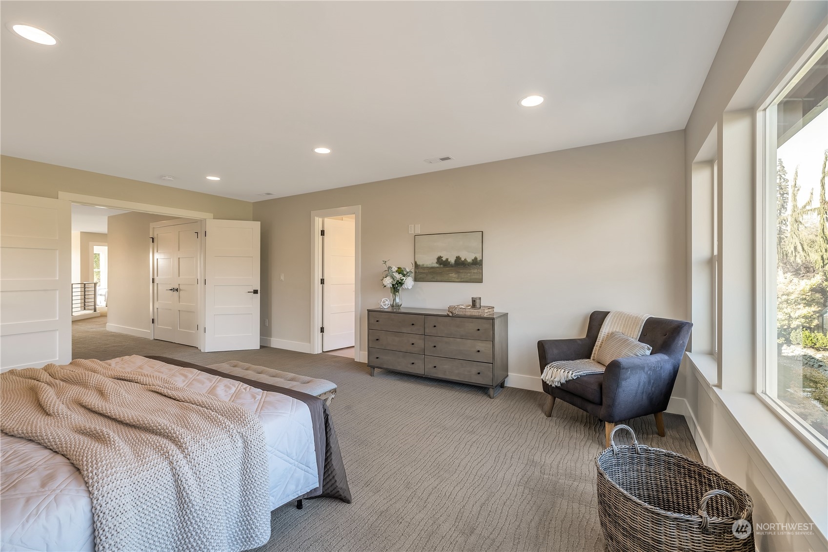 421 Rockefeller Avenue Everett, WA 98201 - Photo 22 of 35 a spacious bedroom with a bed and glass window