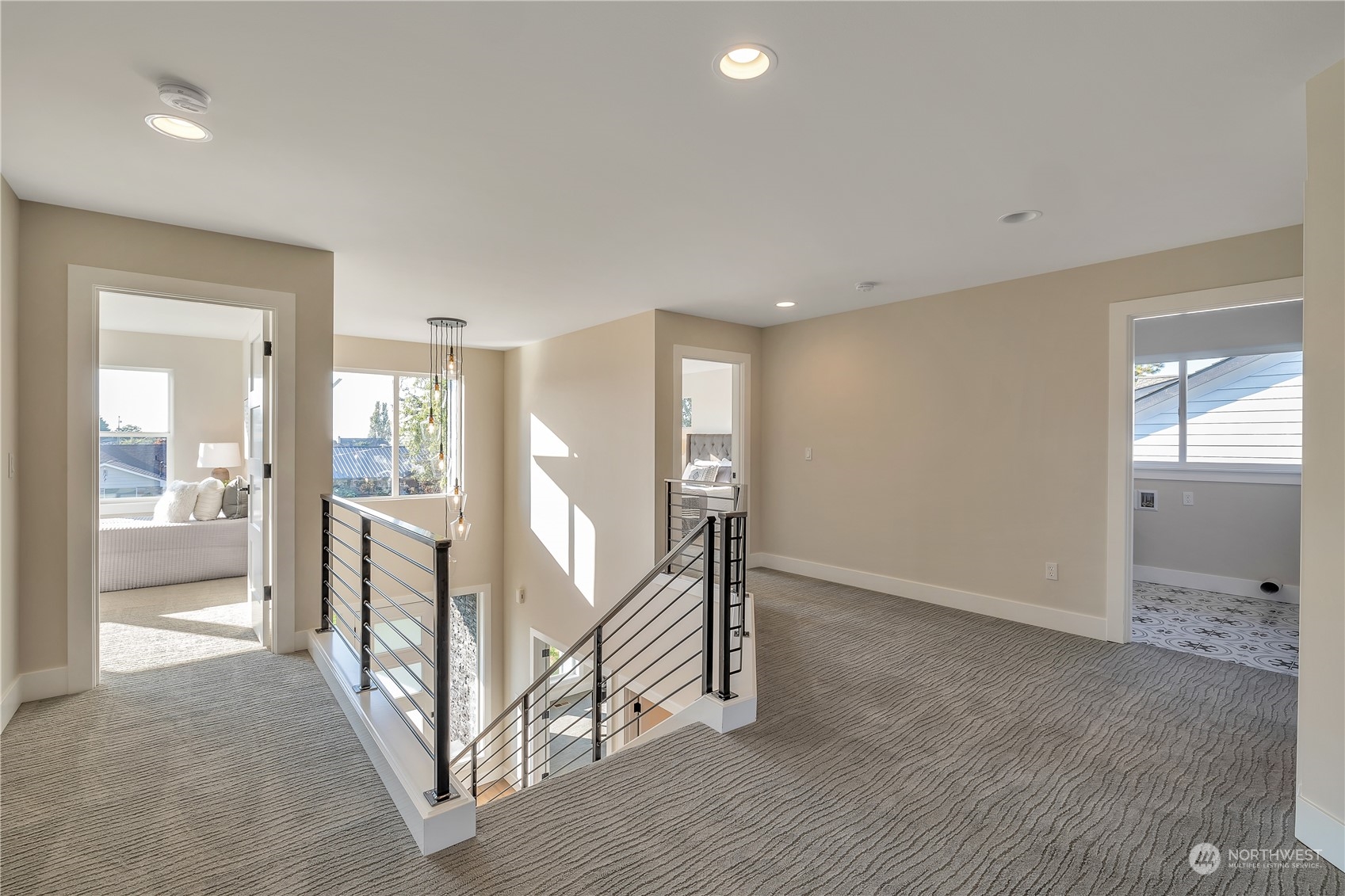 421 Rockefeller Avenue Everett, WA 98201 - Photo 26 of 35 a view of a room with stairs and a floor to ceiling window