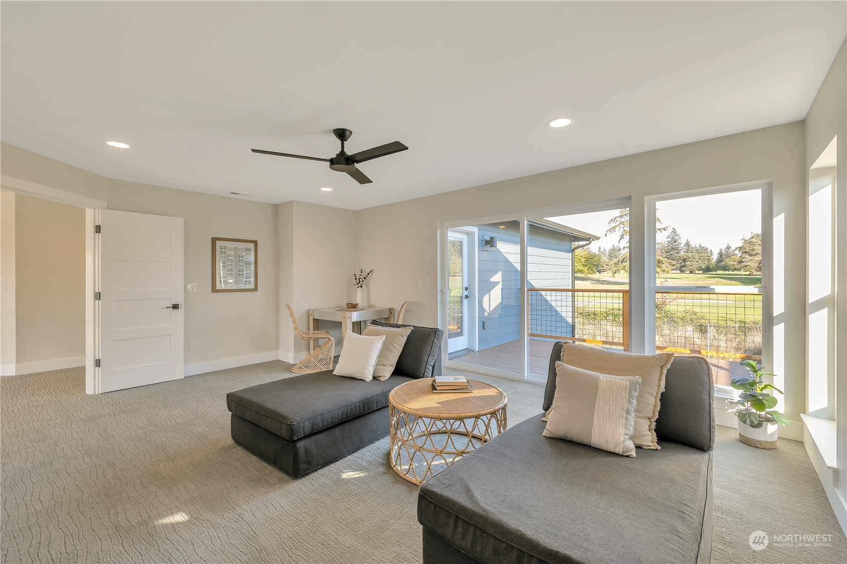 421 Rockefeller Avenue Everett, WA 98201 - Photo 28 of 35 a living room with furniture and a large window with balcony view