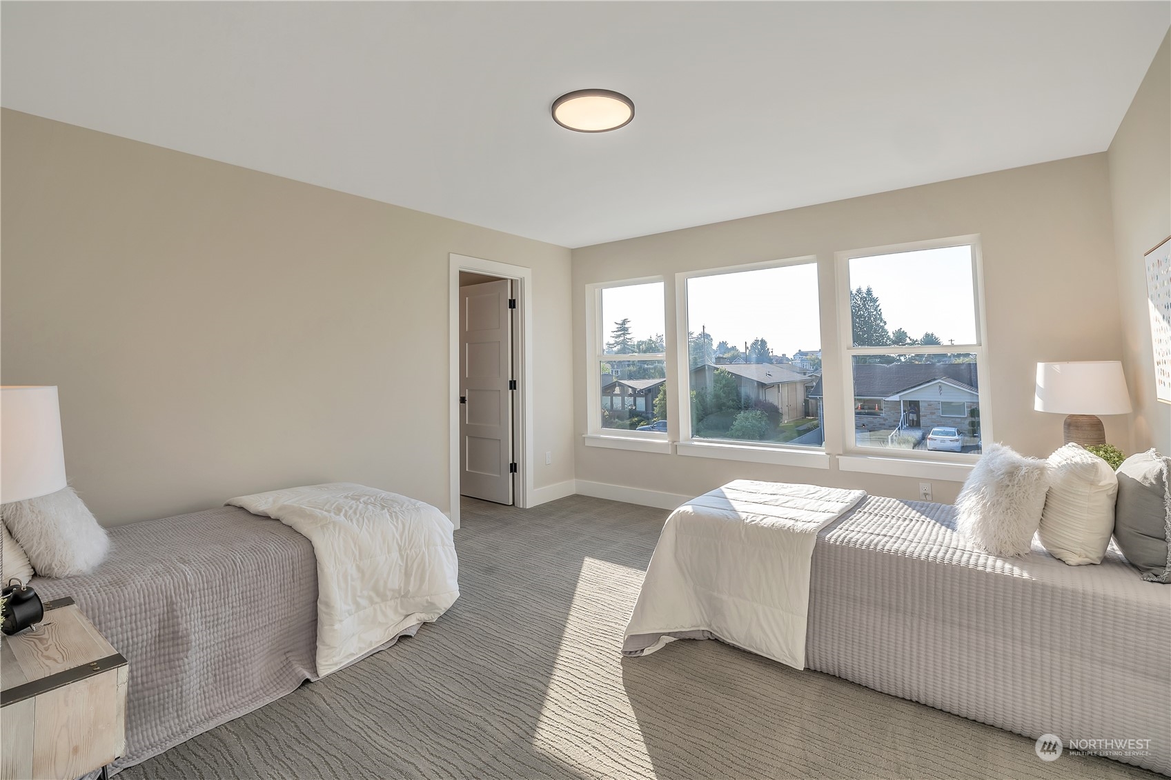 421 Rockefeller Avenue Everett, WA 98201 - Photo 29 of 35 a bedroom with a bed and a large window