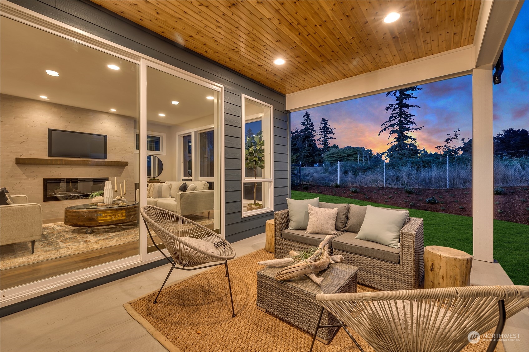 421 Rockefeller Avenue Everett, WA 98201 - Photo 30 of 35 a outdoor living space with furniture and a flat screen tv