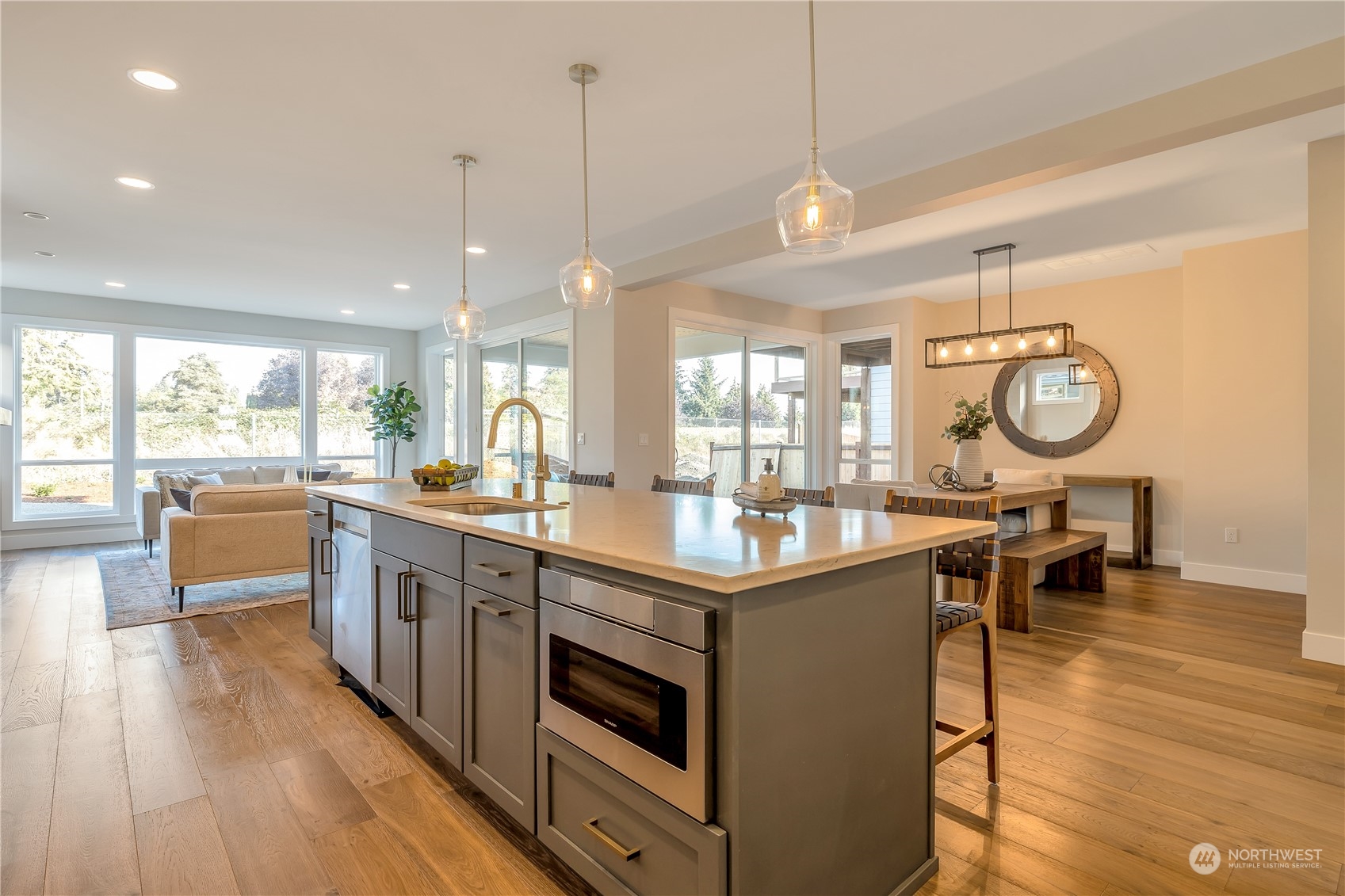 421 Rockefeller Avenue Everett, WA 98201 - Photo 7 of 35 a kitchen with stainless steel appliances granite countertop counter space a sink and living room view