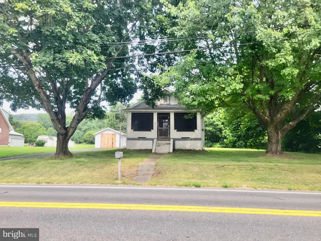 a view of a house with a swimming pool