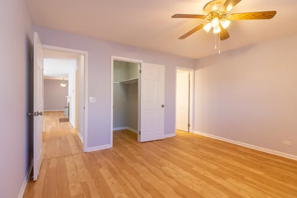 a bathroom with a sink toilet a mirror and shower