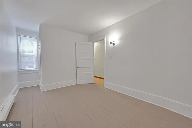 an empty room with an entryway