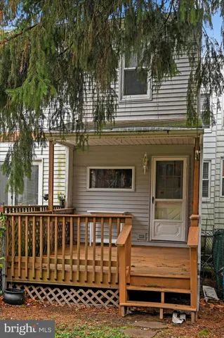 a view of a house with a deck