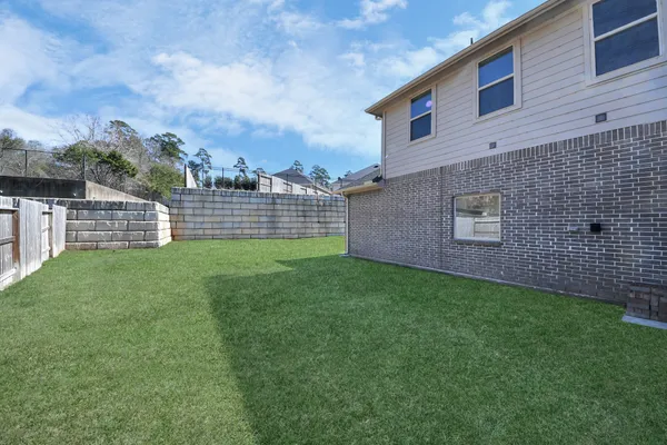 a view of a backyard with a garden