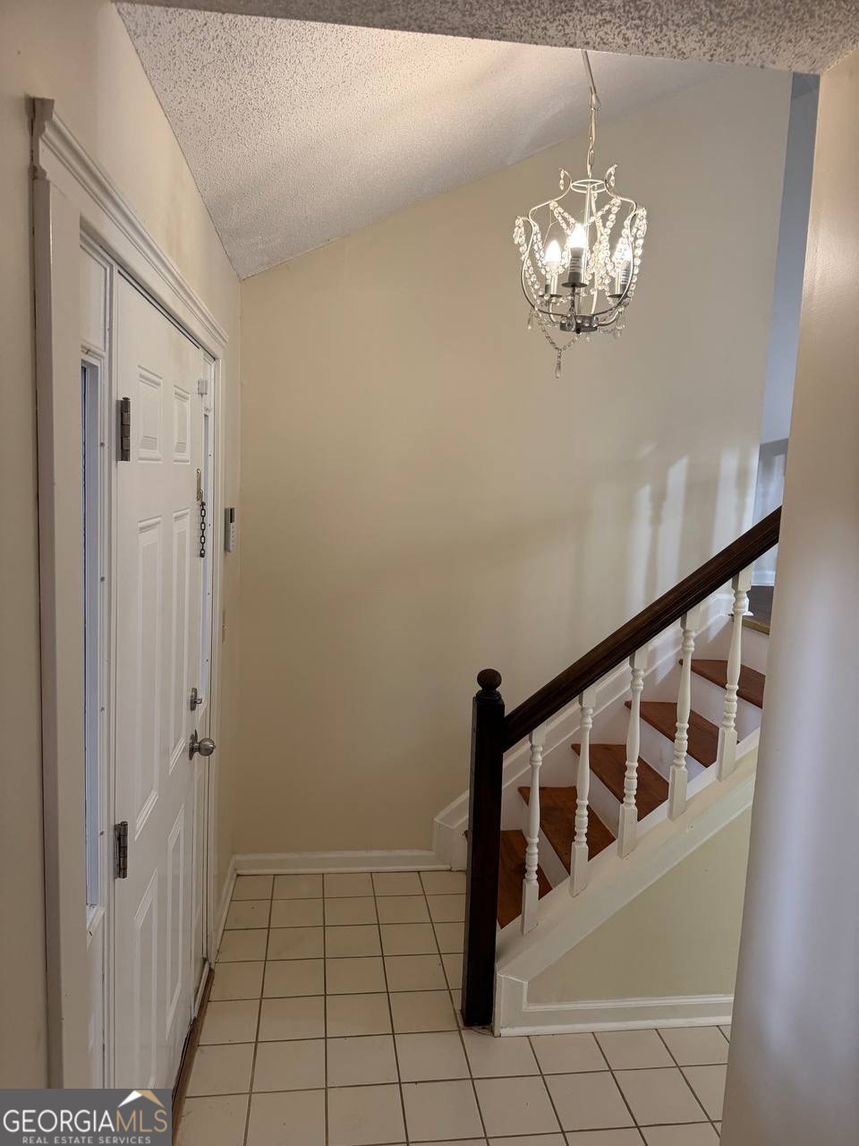3821 Rex Mill Square Rex, GA 30273 - Photo 32 of 51 a view of an entryway with chandelier