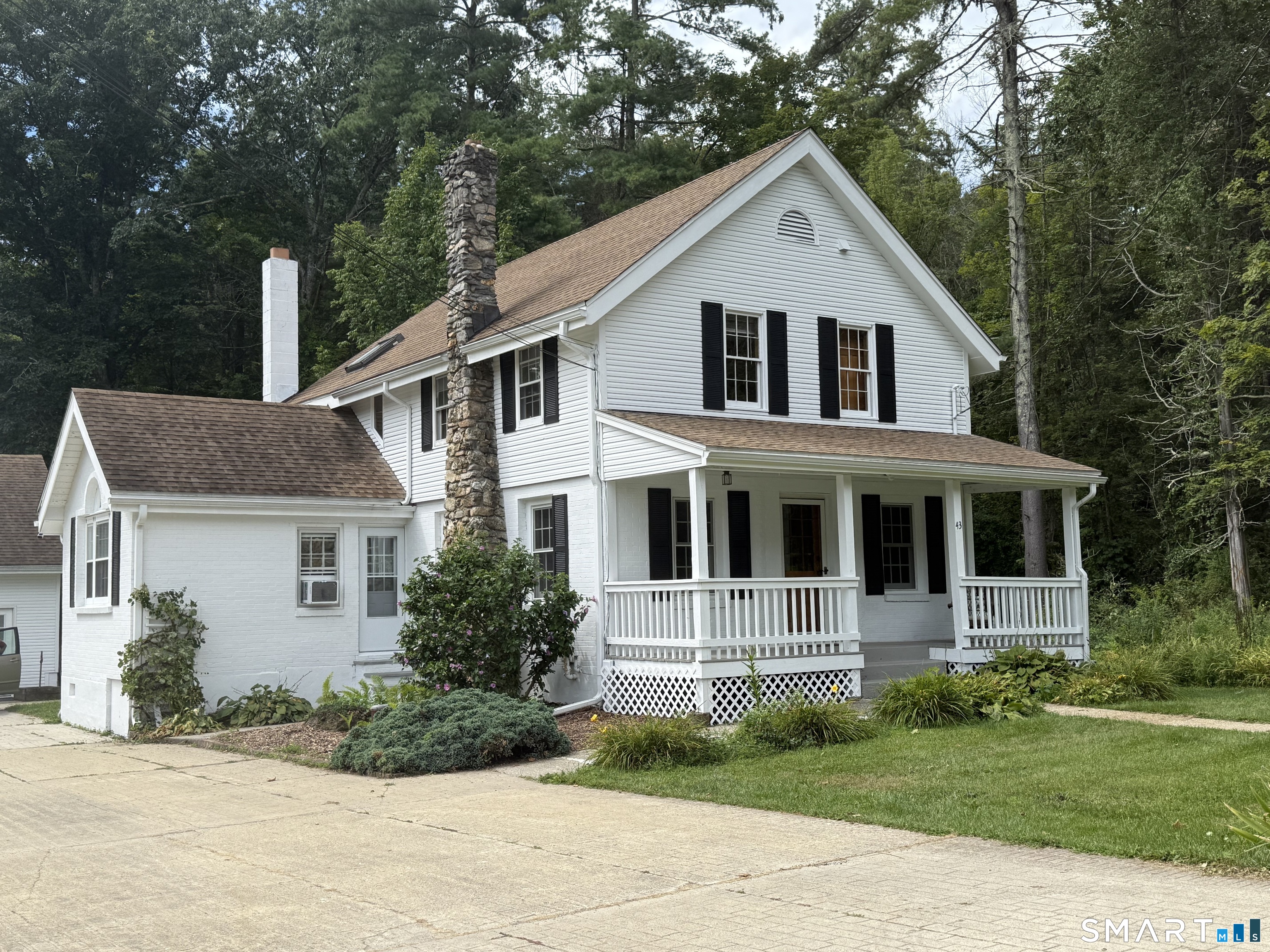 43 Dublin Road Canaan, CT 06031 - Photo 1 of 11 a front view of a house with a garden