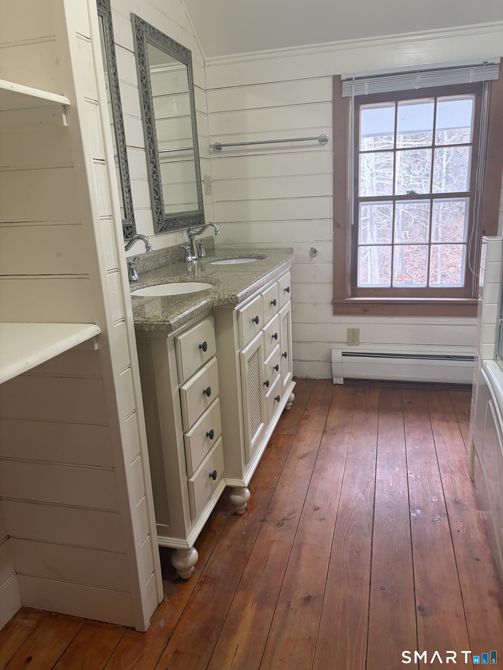 43 Dublin Road Canaan, CT 06031 - Photo 10 of 11 a bathroom with a sink a mirror and a window