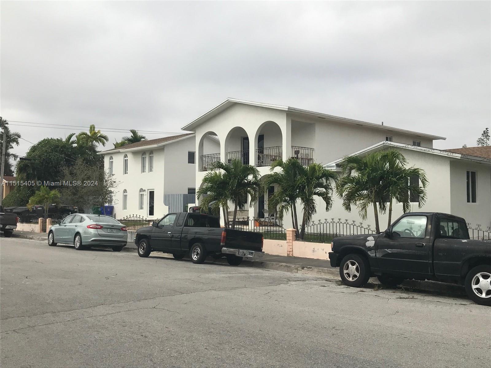 1355 Southwest 12th Street Miami, FL 33135 - Photo 11 of 18 a view of a car parked in front of a house
