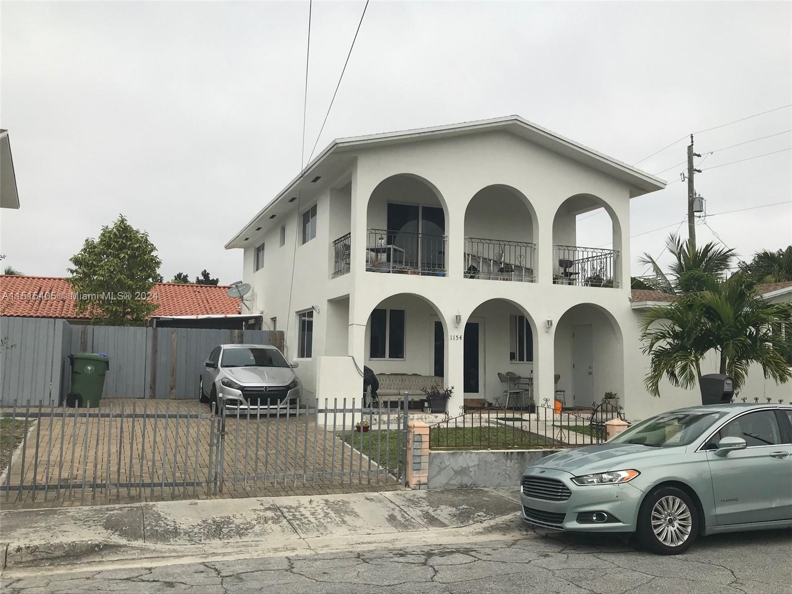 1355 Southwest 12th Street Miami, FL 33135 - Photo 18 of 18 a front view of a house with garden