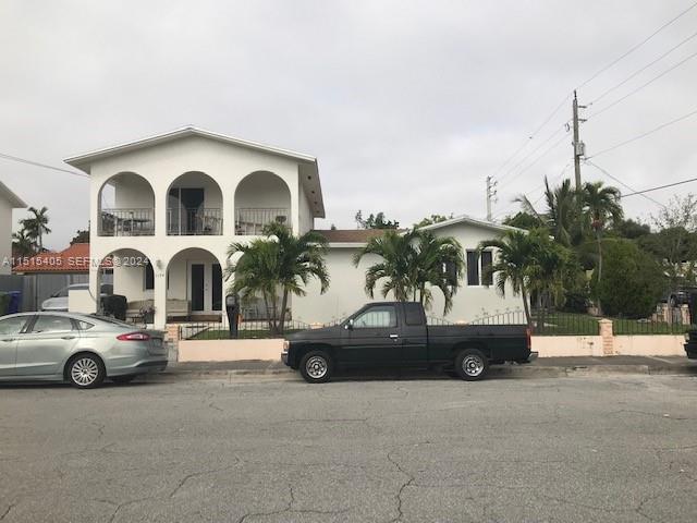 1355 Southwest 12th Street Miami, FL 33135 - Photo 3 of 18 a car parked in front of a house