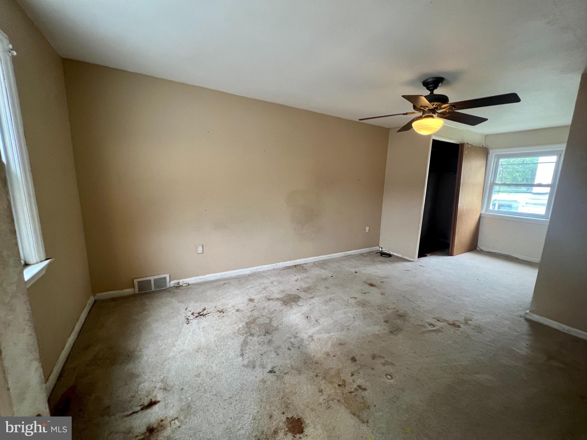 841 Maple Avenue Berwyn, PA 19312 - Photo 11 of 14 a view of a livingroom with a ceiling fan and window