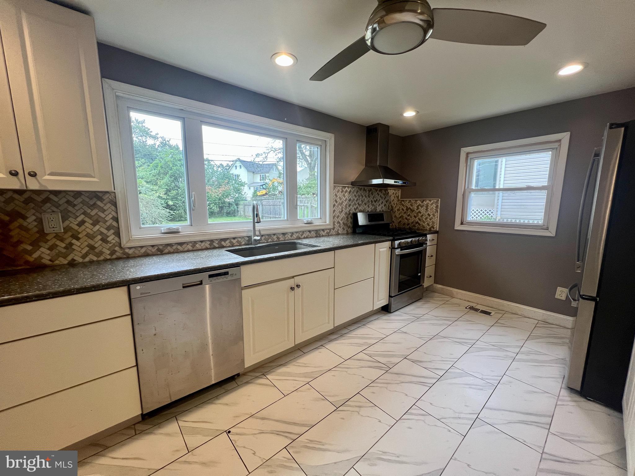 841 Maple Avenue Berwyn, PA 19312 - Photo 4 of 14 a kitchen with a sink and cabinets
