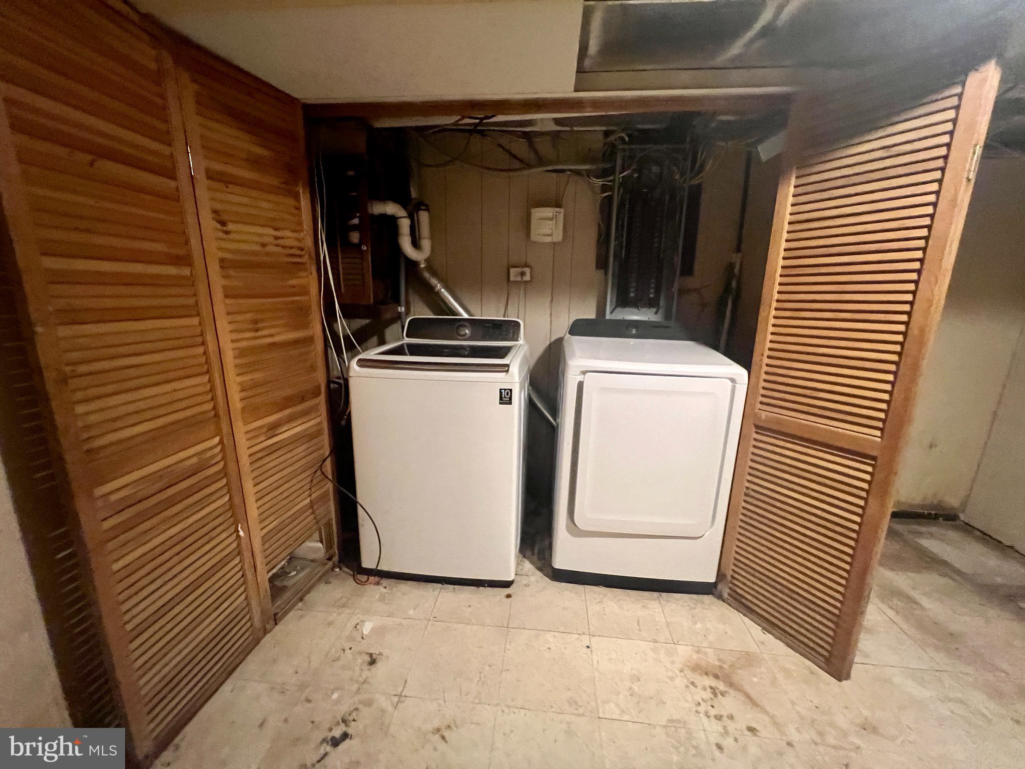 841 Maple Avenue Berwyn, PA 19312 - Photo 6 of 14 a utility room with dryer and washer