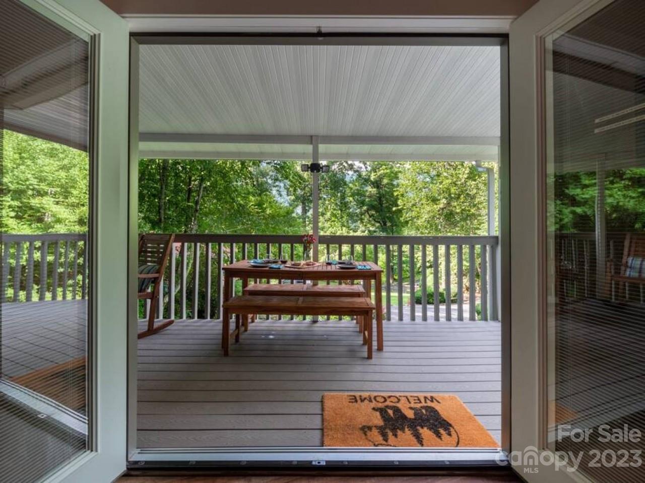 180 Hemlock Loop Maggie Valley, NC 28751 - Photo 28 of 28 a view of a chairs and table in the balcony