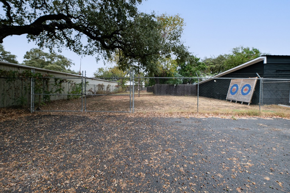321 East Fannin Street Luling, TX 78648 - Photo 29 of 29 a backyard of a house with lots of green space