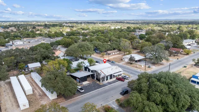 an aerial view of residential house with outdoor space
