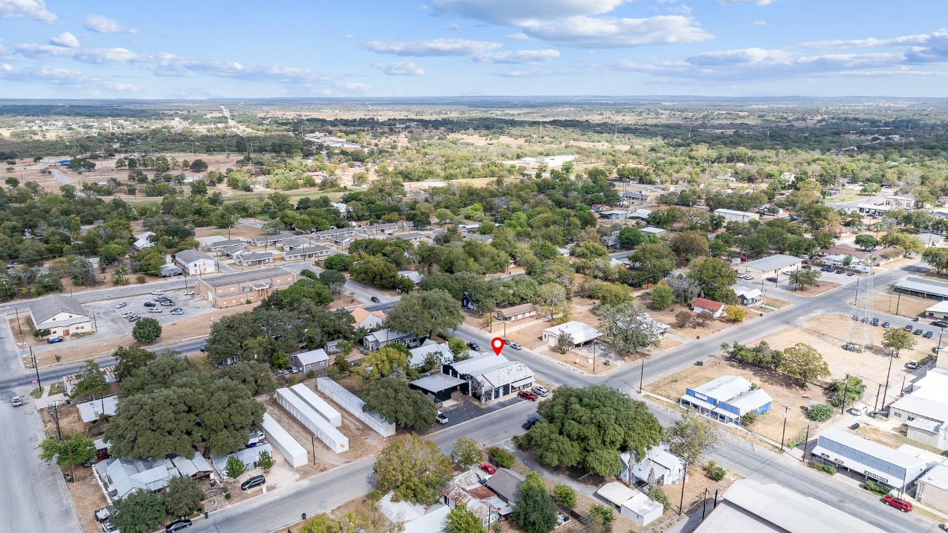 321 East Fannin Street Luling, TX 78648 - Photo 9 of 29 an aerial view of residential building with green space