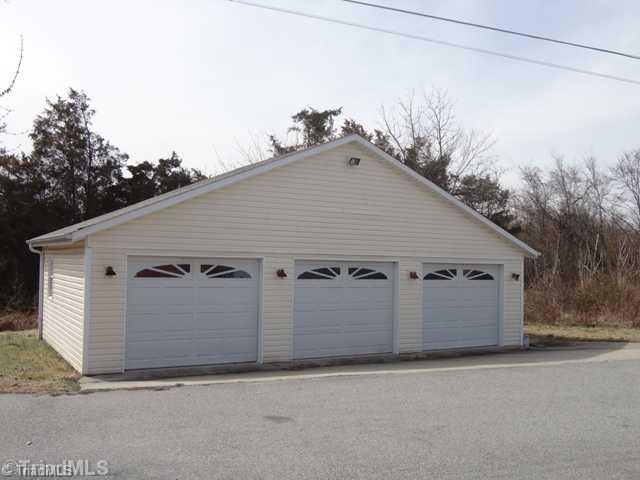 7003 Turnpike Road High Point, NC 27263 - Photo 2 of 16 Parking Lot/Garage. 3 Car garage is an unusual fine in this price range