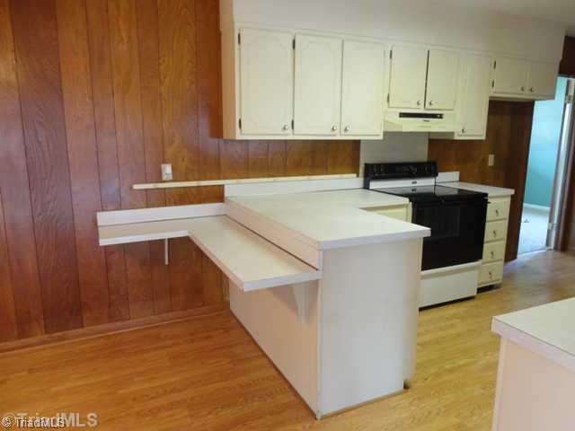 7003 Turnpike Road High Point, NC 27263 - Photo 8 of 16 Kitchen. Bar for extra seating