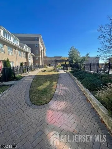 a view of a swimming pool with a yard