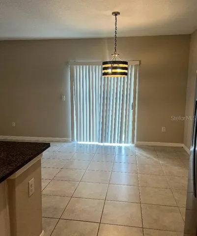 a view of a livingroom with a furniture