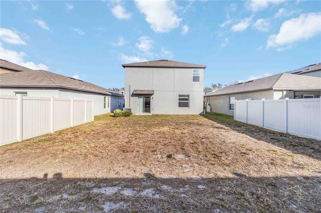 1777 Fred Ives Street Ruskin, FL 33570 - Photo 29 of 35 a view of backyard of house
