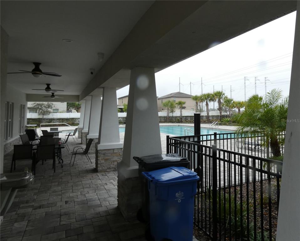 1777 Fred Ives Street Ruskin, FL 33570 - Photo 34 of 35 a view of a porch with chairs