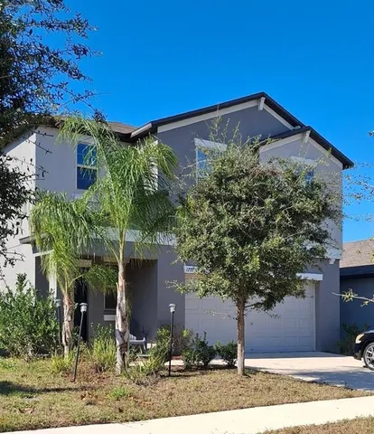 front view of a house with a patio