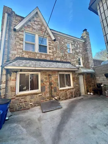 front view of a house with yard