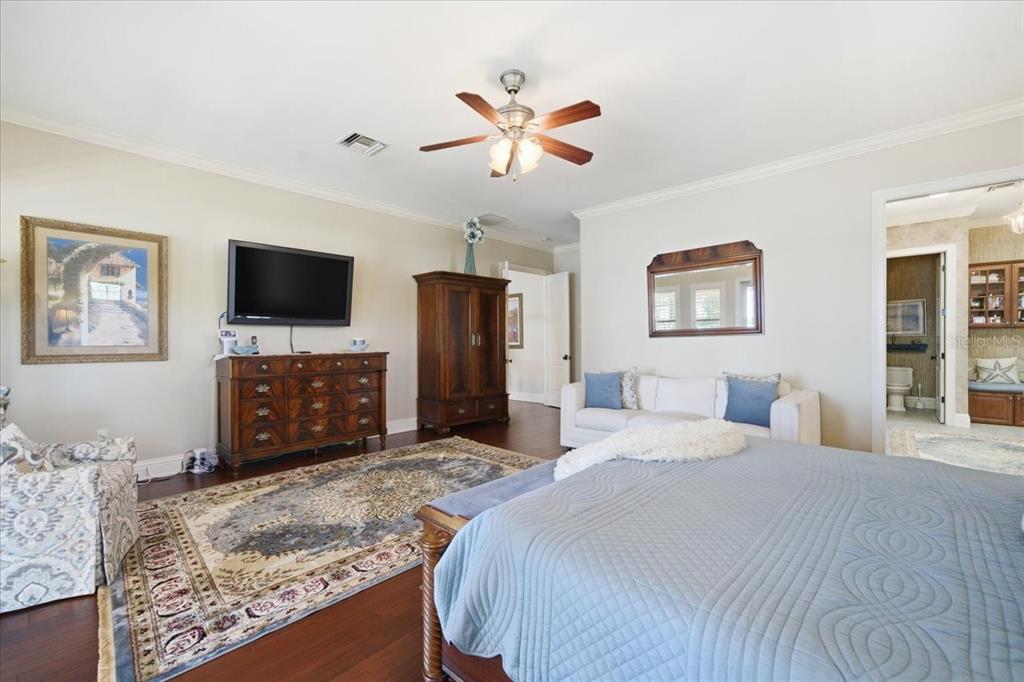 18258 Wayne Road Odessa, FL 33556 - Photo 46 of 100 a bedroom with a bed and a flat screen tv