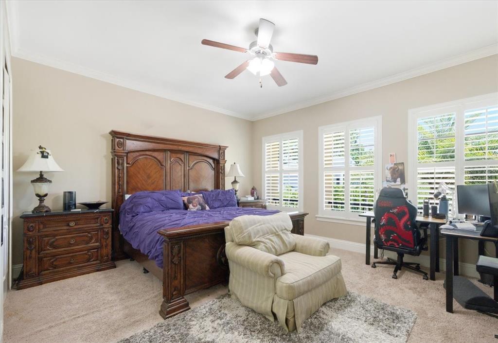 18258 Wayne Road Odessa, FL 33556 - Photo 59 of 100 a bedroom with a bed and a couch