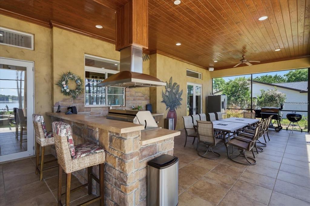 18258 Wayne Road Odessa, FL 33556 - Photo 75 of 100 a view of a patio with table and chairs