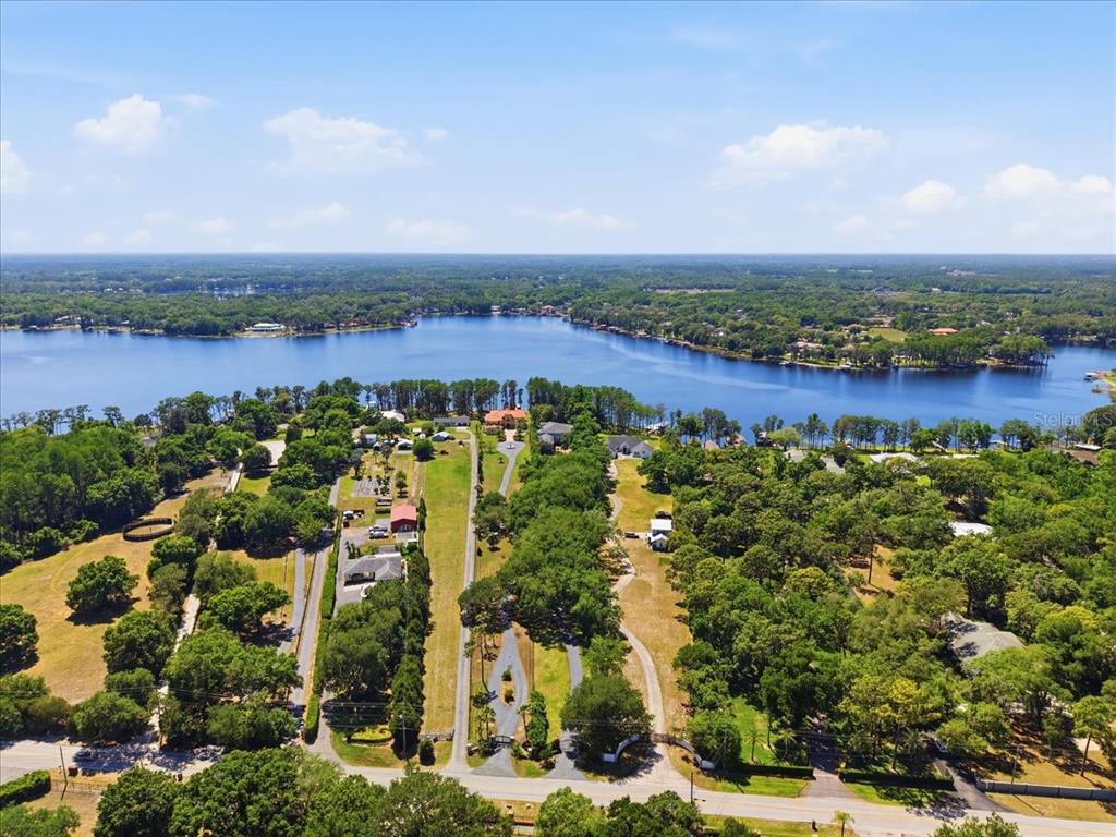 18258 Wayne Road Odessa, FL 33556 - Photo 97 of 100 an aerial view of multiple house with outdoor space