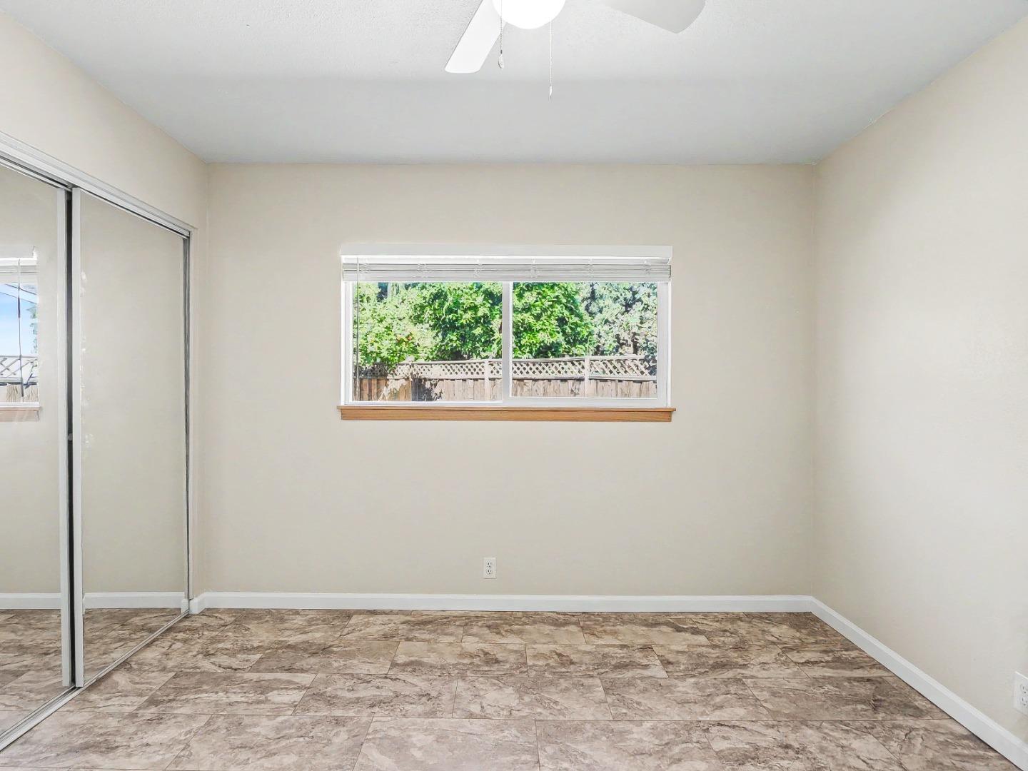 6455 Kensington Place Gilroy, CA 95020 - Photo 22 of 32 an empty room with a window