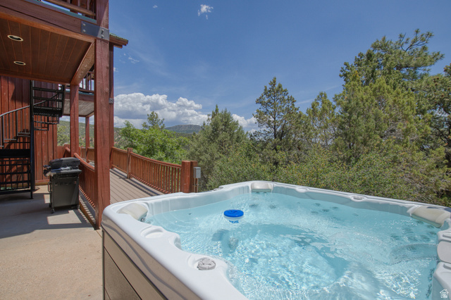 755 South Zion Ridge Drive Orderville, UT 84758 - Photo 17 of 84 Deck with a hot tub and grilling area
