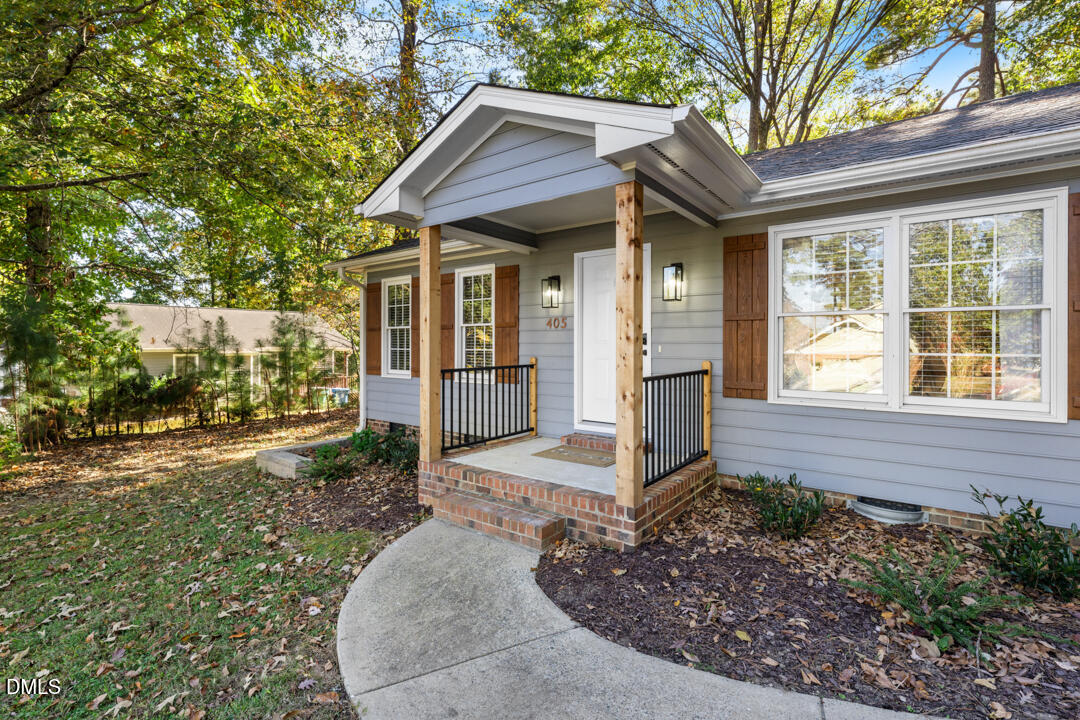 405 Latta Road Durham, NC 27712 - Photo 2 of 43 a front view of a house with a yard