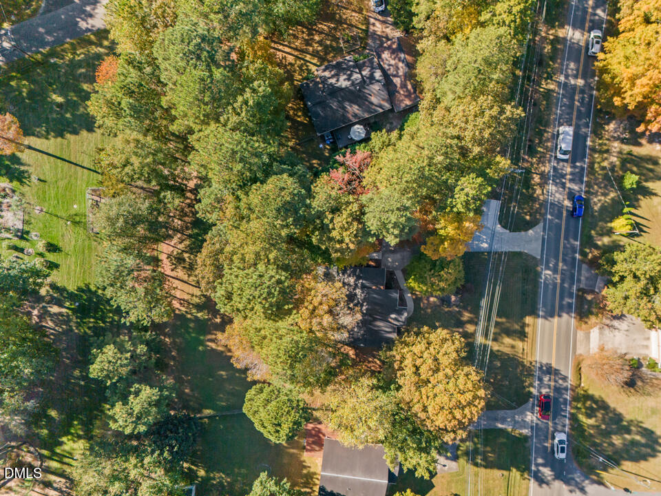 405 Latta Road Durham, NC 27712 - Photo 39 of 43 a backyard of a house with lots of green space