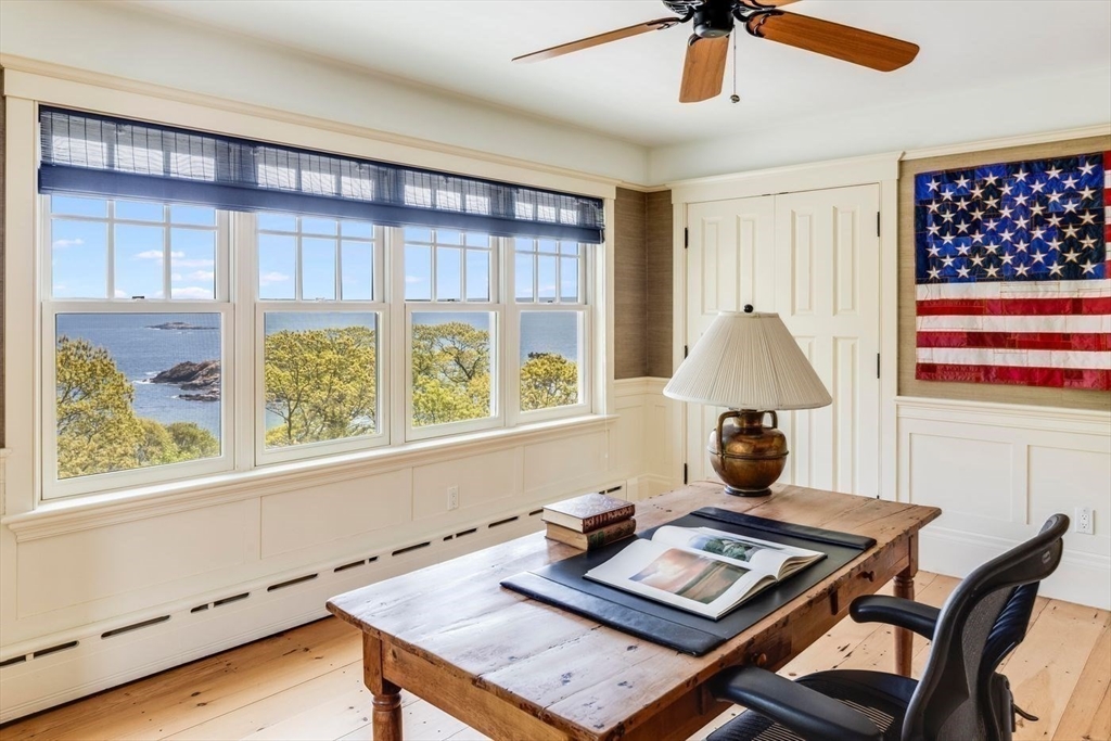 239 Summer Street Manchester, MA 01944 - Photo 30 of 42 a living room with furniture and a window