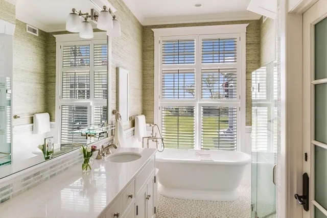 an aerial view of a house with a swimming pool outdoor seating and yard