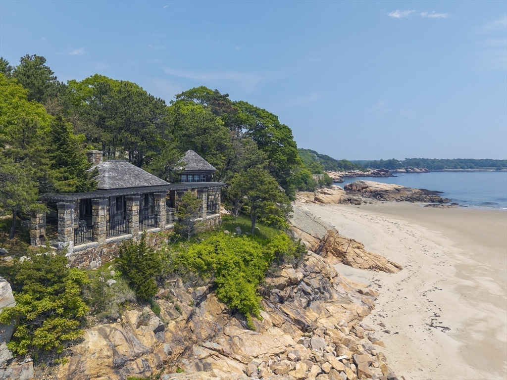 239 Summer Street Manchester, MA 01944 - Photo 5 of 42 a front view of a house with a yard
