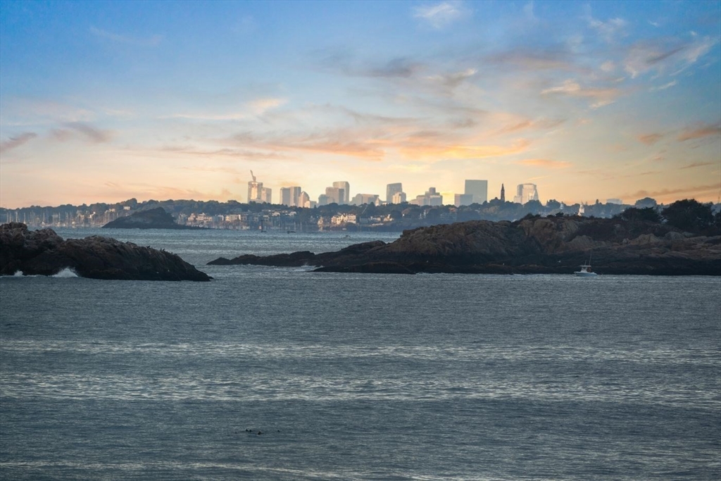 239 Summer Street Manchester, MA 01944 - Photo 7 of 42 a view of a lake