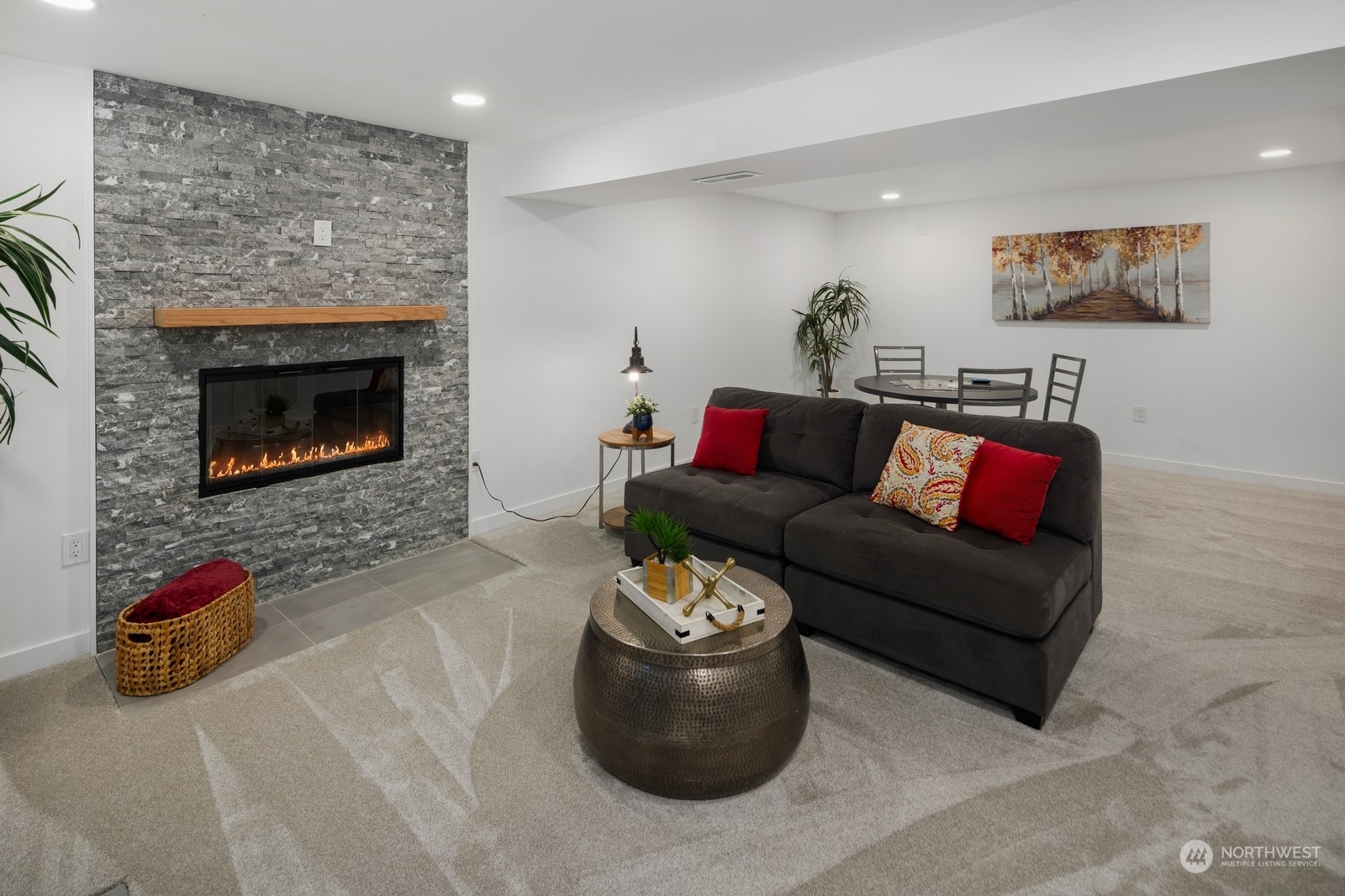233 Poppy Road Bothell, WA 98012 - Photo 18 of 36 a living room with furniture and a fireplace