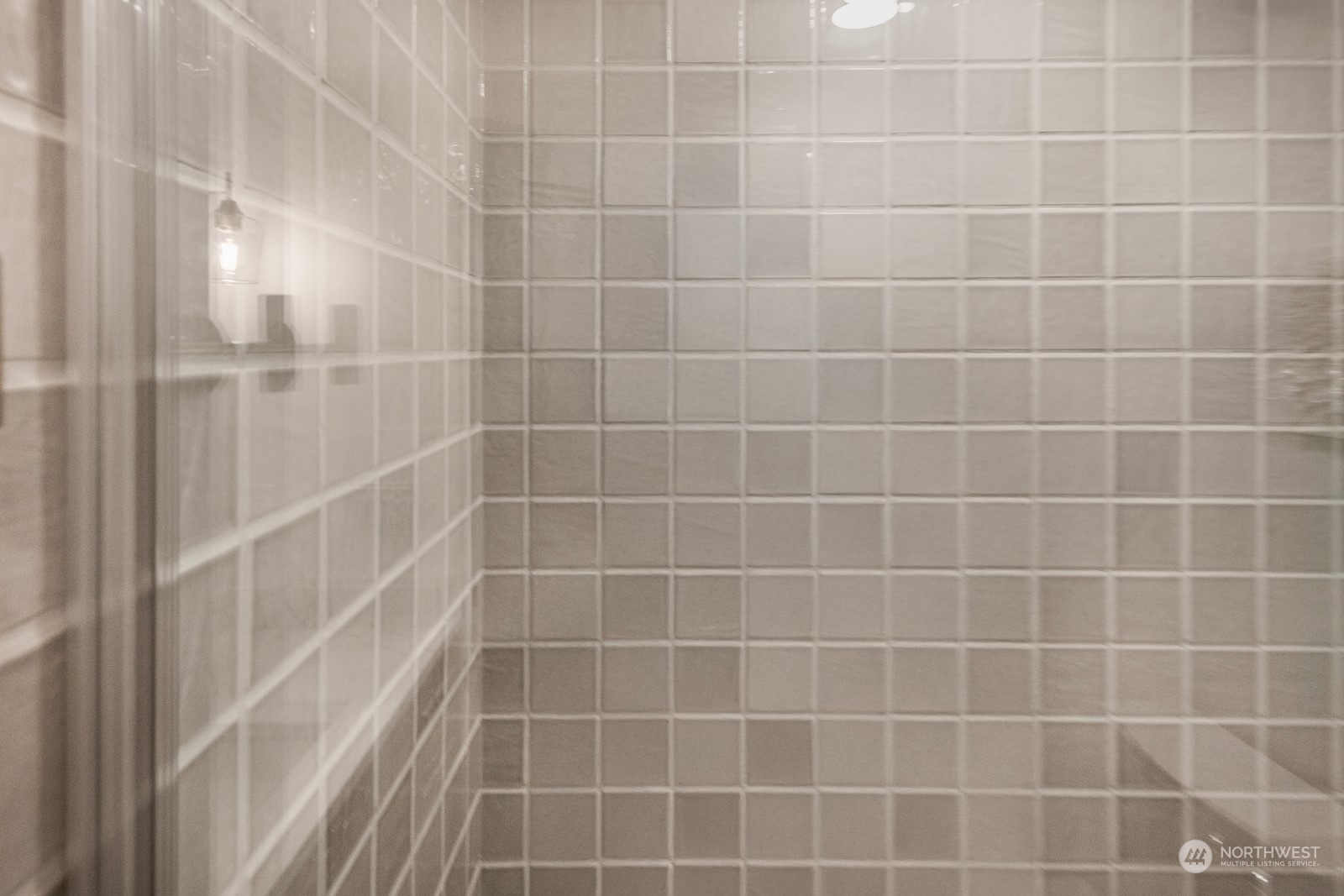 233 Poppy Road Bothell, WA 98012 - Photo 25 of 36 a bathroom with a shower